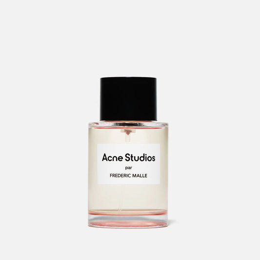 Acne Studios perfume bottle with black cap on a white background