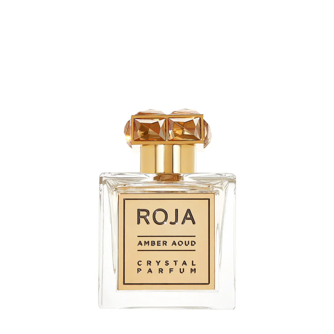 Roja Amber Aoud crystal parfum bottle on a white background